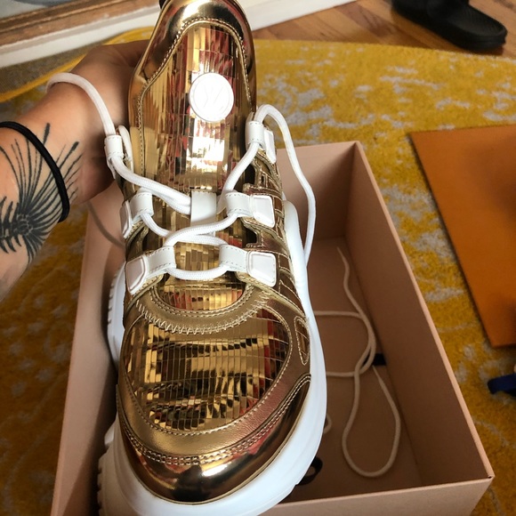 Metallic Gold Louis Vuitton arch light sneakers. - Picture 6 of 7
